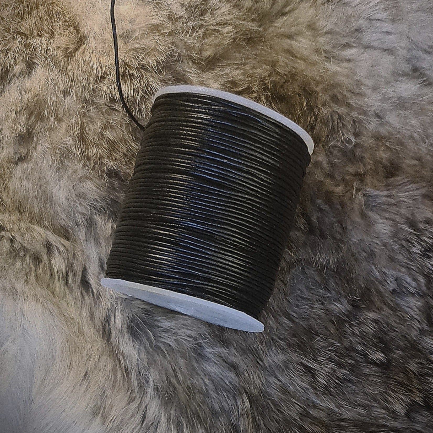 Leather strap on a large roll