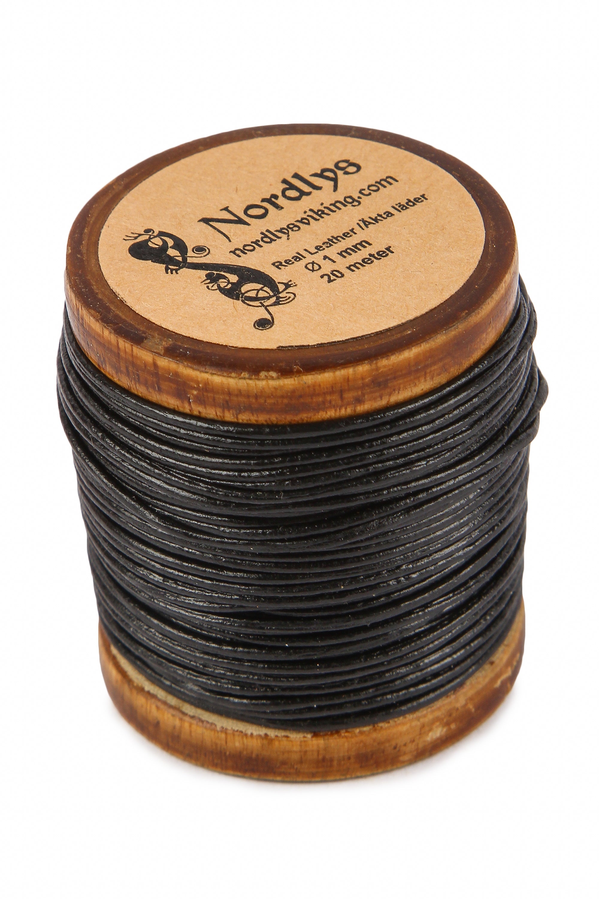 Leather string in black leather. One millimeter thick and 20 meters long. High quality string that is seamless and made from natural leather. Rolled onto a traditional wooden spool.