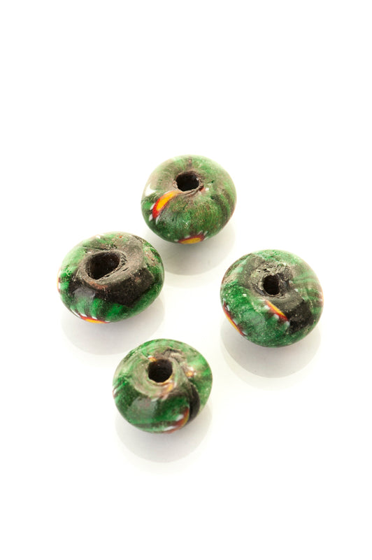 Green glass bead with millifiori decor, Viking