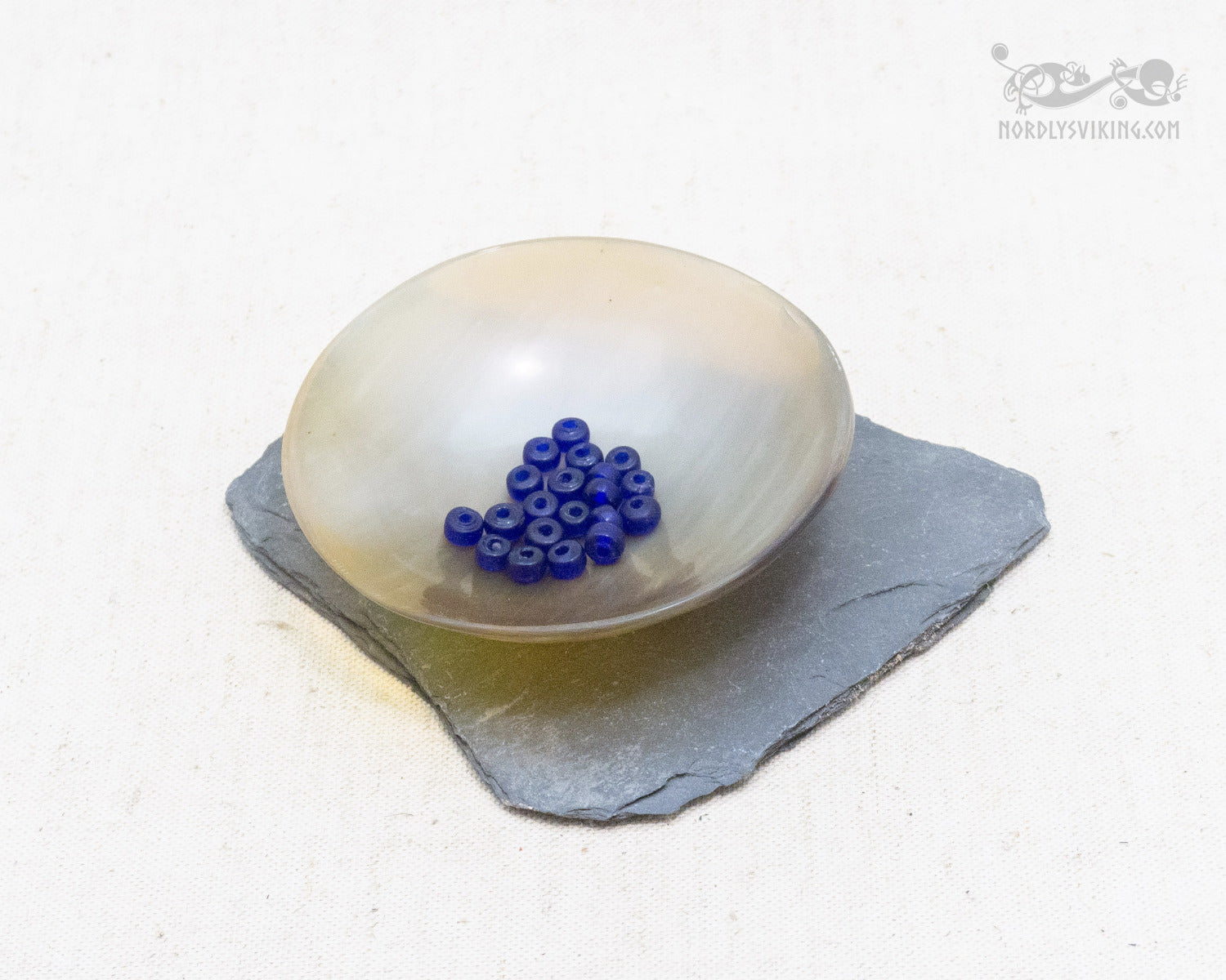 Small dark blue glass beads, 100 grams