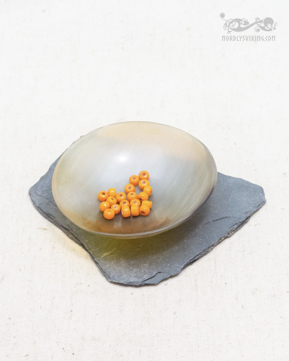 Small orange glass beads, 100 grams