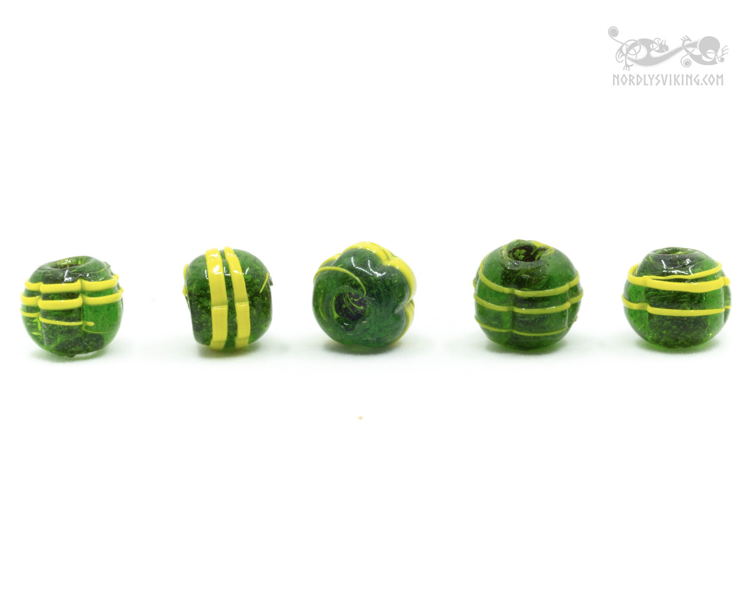 Dark green melon-shaped glass bead with yellow decor
